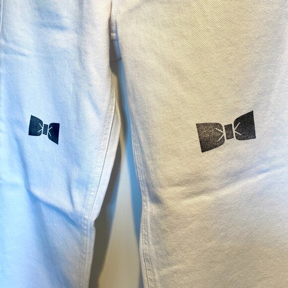 KIMHĒKIM White Bow Stamped Jeans - Picture 7 of 8